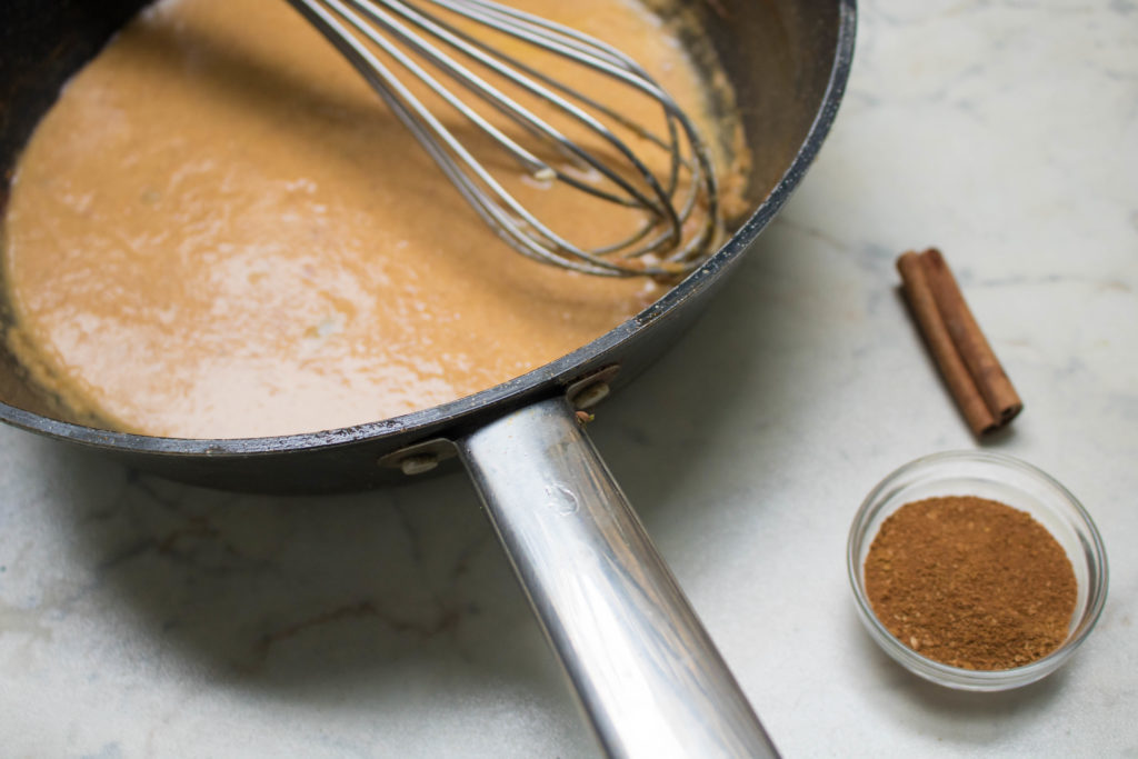 whisking pumpkin puree for pumpkin spice latte