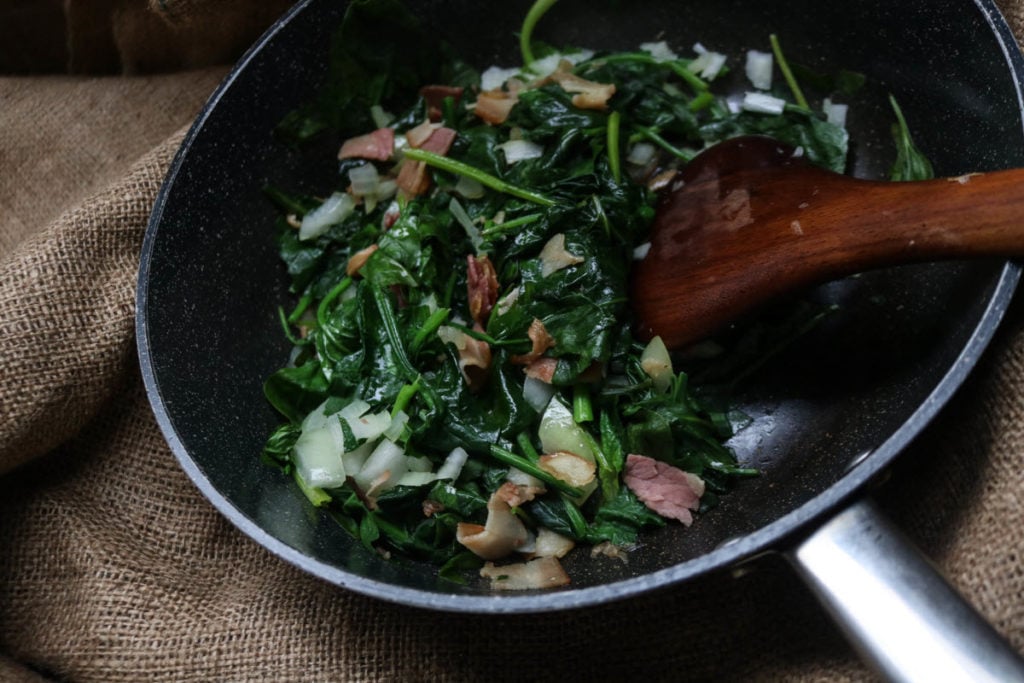 keto quiche recipe - add spinach, onion to bacon mix