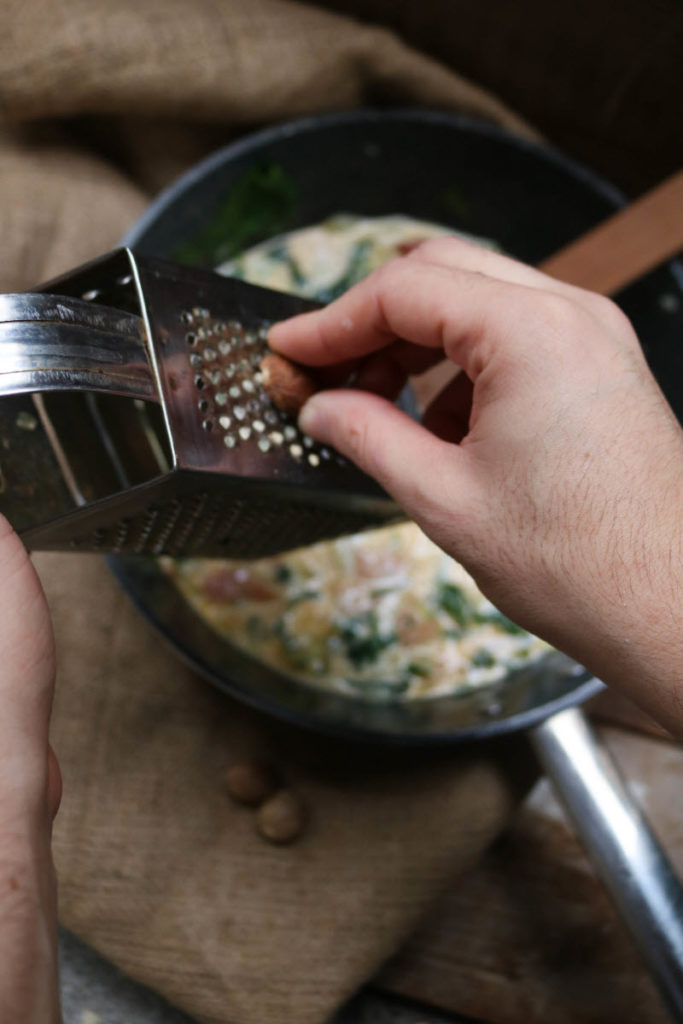 keto quiche recipe - add cheese, cream, eggs, spices